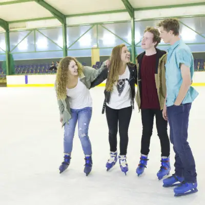 4 people enjoying ice skating