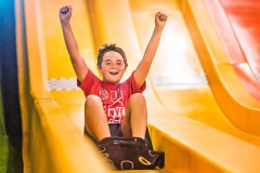 Kid enjoying the giant slide