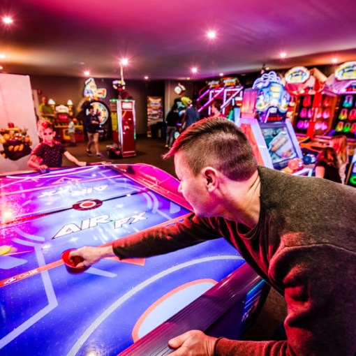 People playing arcade