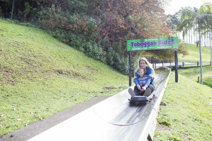 a man riding a skateboard in a park