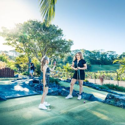 a person riding a skateboard at a skate park