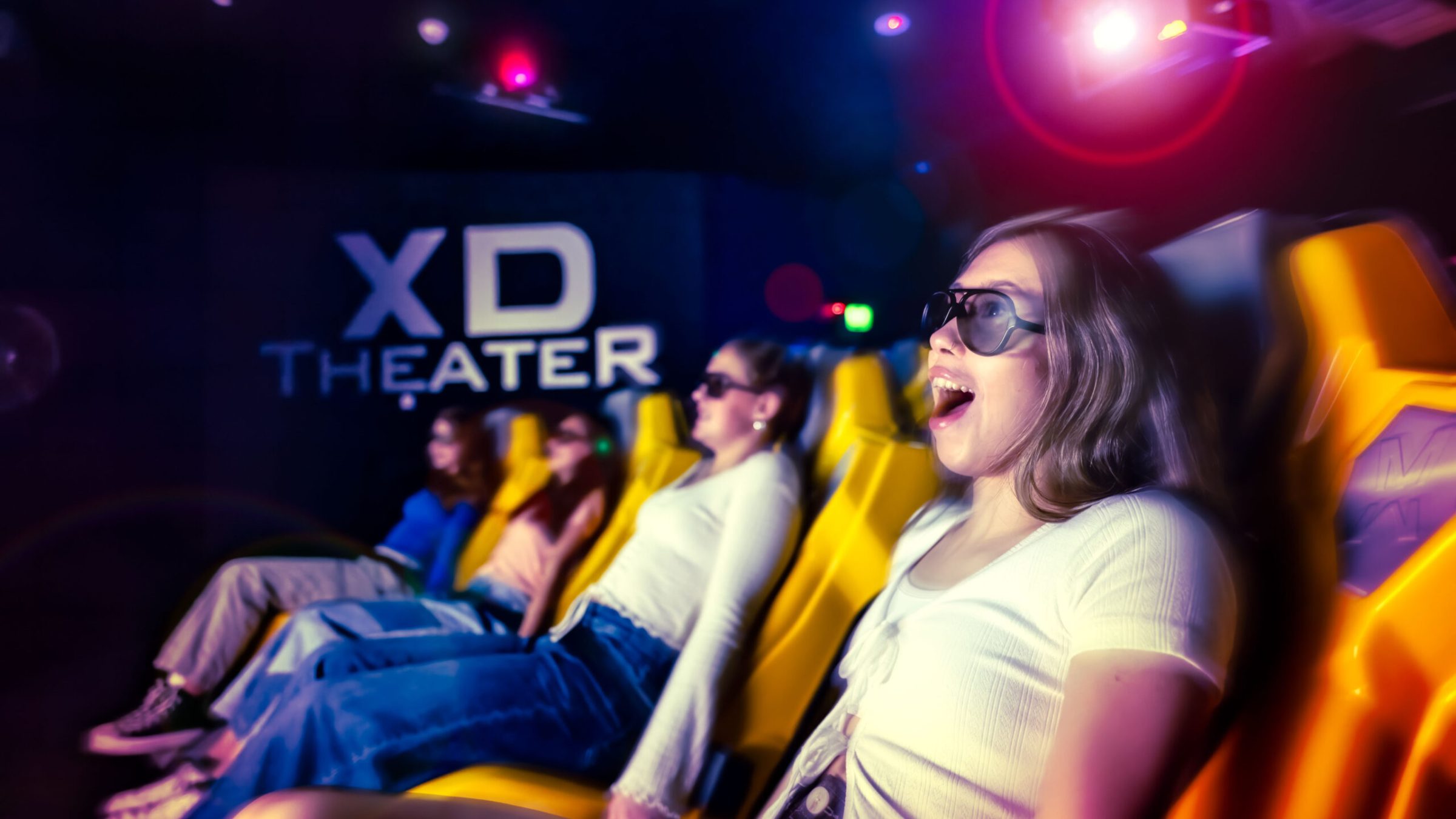 a woman sitting on a stage