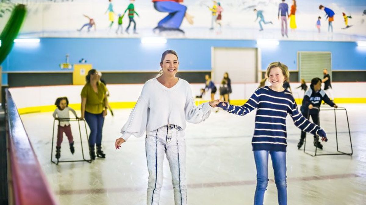 a group of people standing in a room