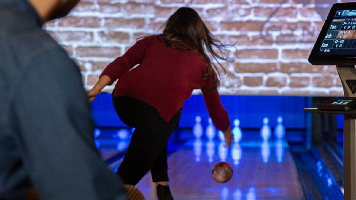a group of people standing in front of a building
