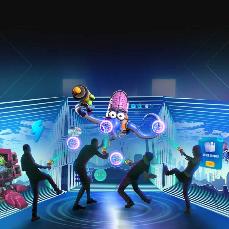 People interacting with a virtual octopus in a digital gaming environment.